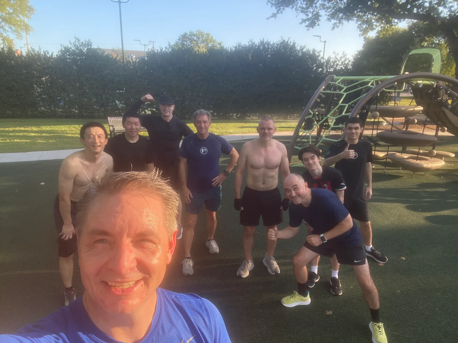 F3 Dallas members gathered at a playground in the morning sunshine